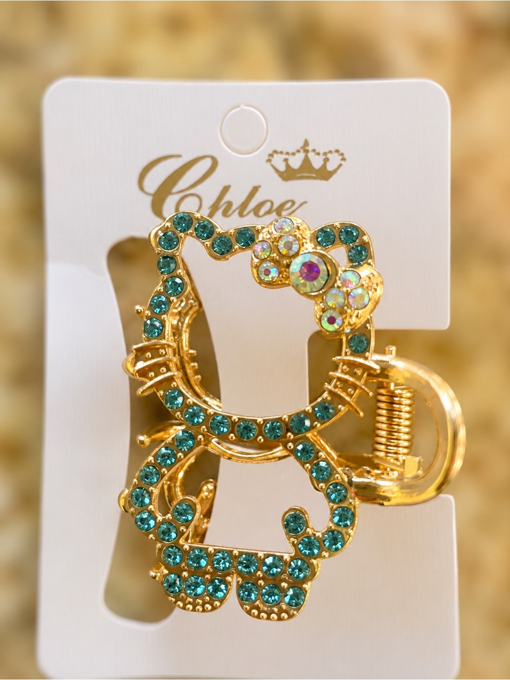 Hello Kitty Gold-Tone Teal Rhinestone Hair Clip